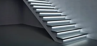 Modern staircase lighting with aluminium stair nosing LED profile and concealed LED strip
