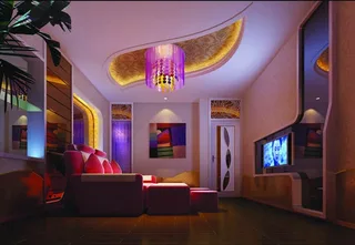 RGB LED strip lighting creating colourful ambient lighting in modern living room interior