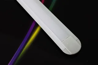 Slim recessed LED profile illuminated showing soft continuous linear lighting output