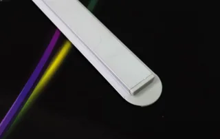 Recessed slim LED aluminium profile lit in dark environment highlighting even light diffusion